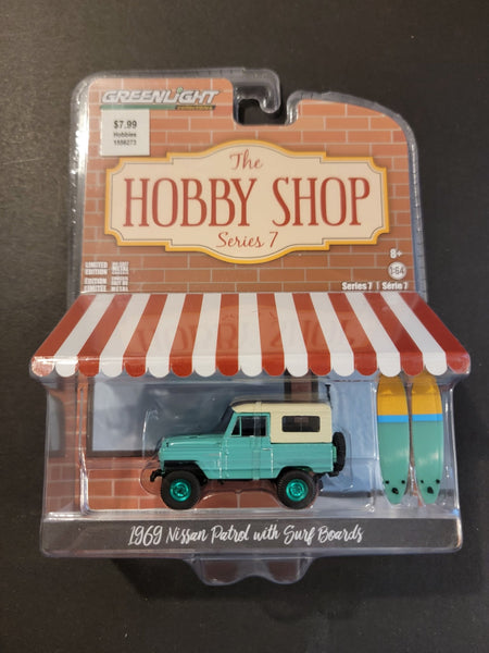 Greenlight - 1969 Nissan Patrol with Surf Boards - 2019 Hobby Shop Series *Chase* - Top CollectiblesDiecastGreenlight