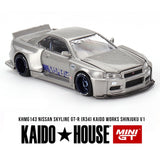 Kaido House x Mini GT - Nissan Skyline GT - R (R34) Kaido Works SHINJUKU V1 – Silver *Sealed, Possibility of a Chase - Pre - Order* - Top CollectiblesDiecastMini GT