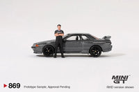 Mini GT - Nissan Skyline GT - R (R32) Nismo Gunmetal W/ Matsuda Figure – Tsugio Matsuda Collection *Pre - Order* - Top CollectiblesDiecastMini GT