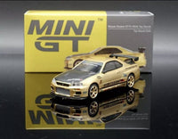 Mini GT - Nissan Skyline GT - R (R34) Top Secret – Gold – Japan Exclusive - Top CollectiblesDiecastMini GT